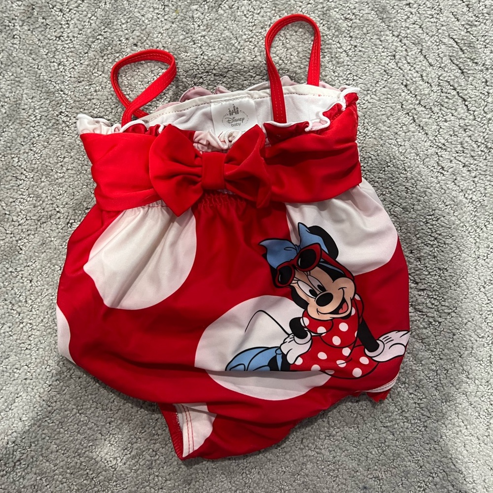 Disney store brand- Minnie Mouse Swimsuit! Great condition.